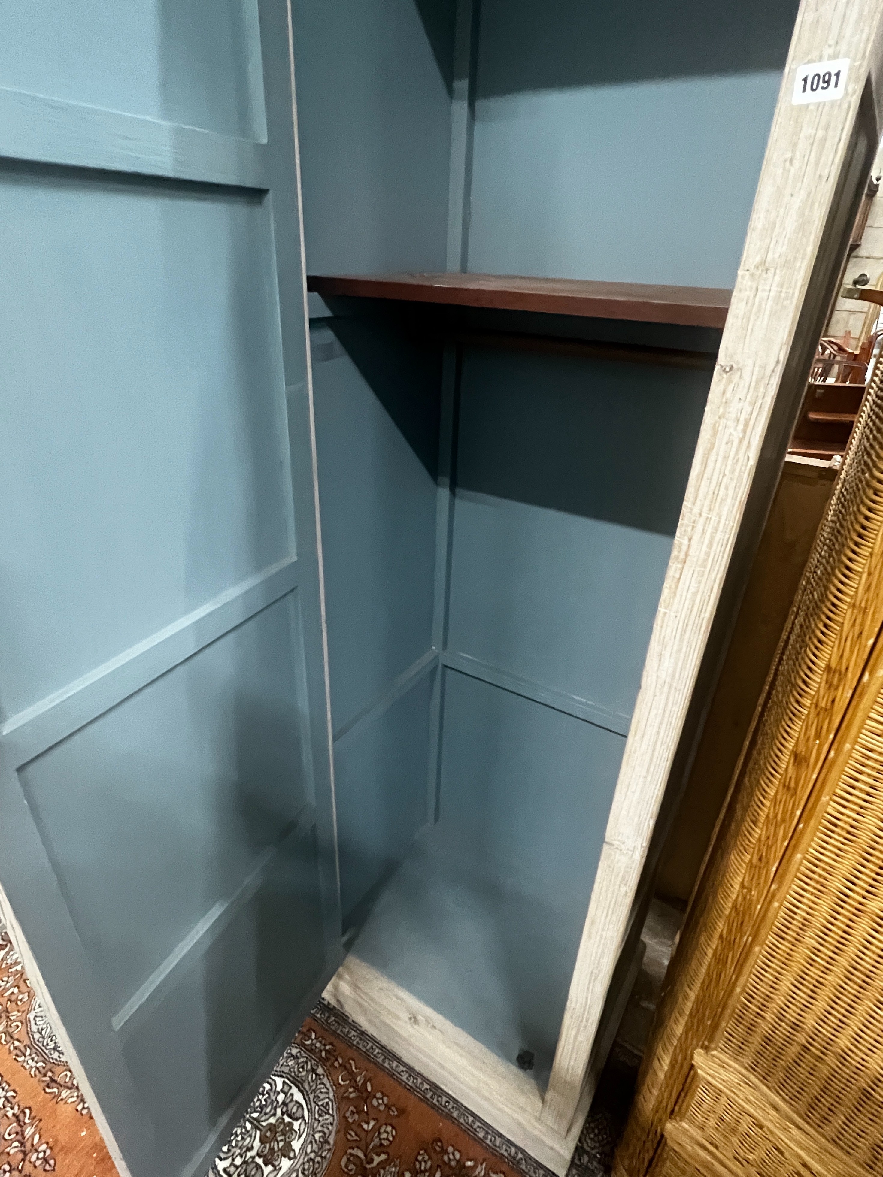 A contemporary Oka painted narrow wardrobe, width 72cm, depth 50cm, height 219cm